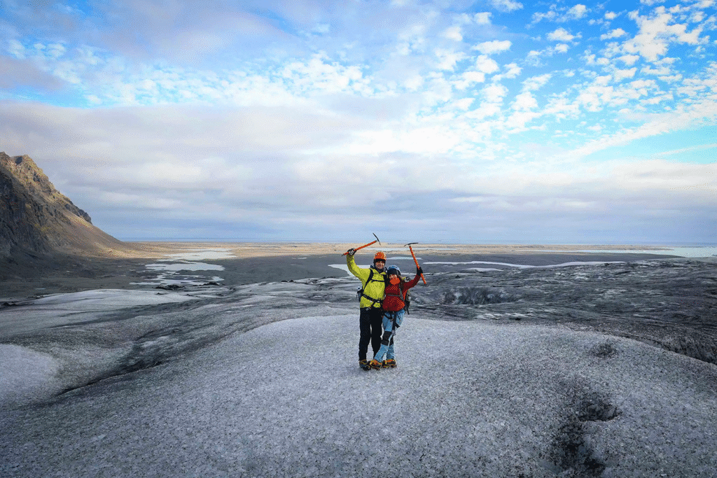 People walking on glacier in Iceland